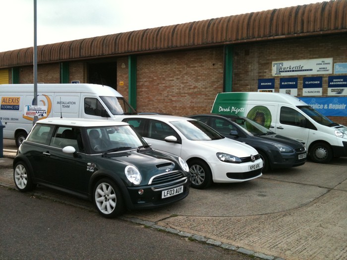 cars outside garage